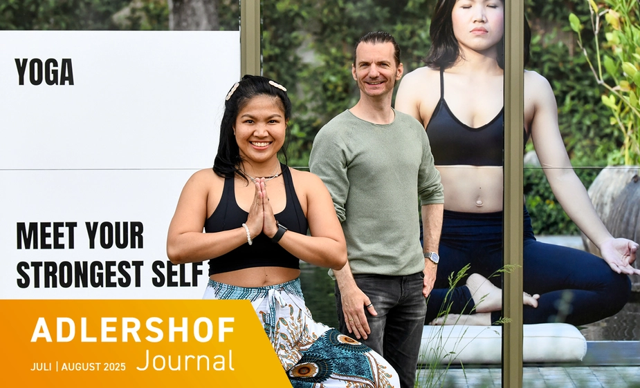 Urai and Timo Schneemann in front of their yoga studio