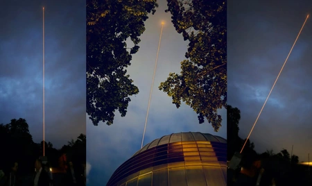 3 photos of a very bright laser beam in the night sky.