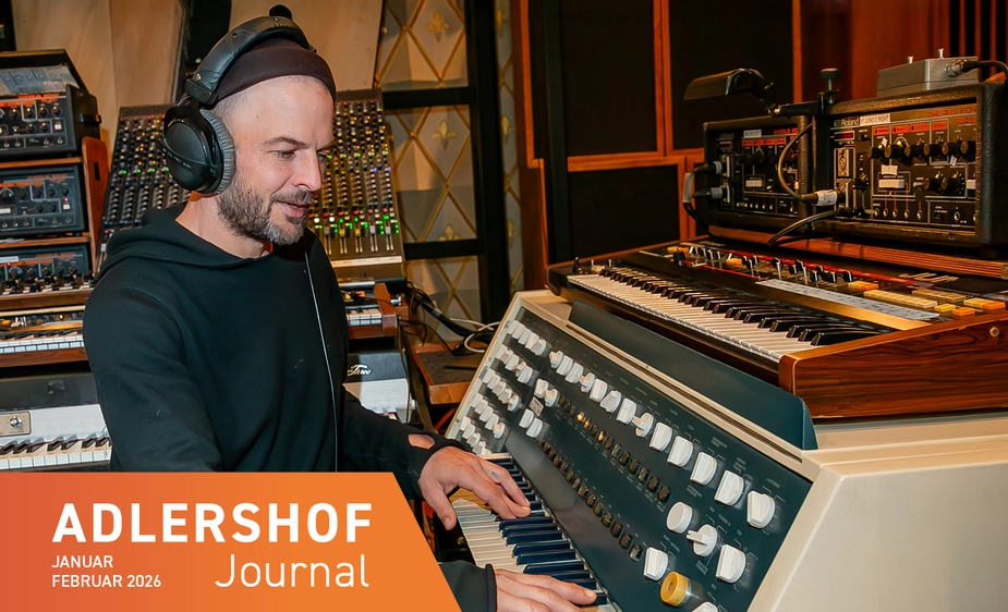 Man wearing headphones in a recording studio